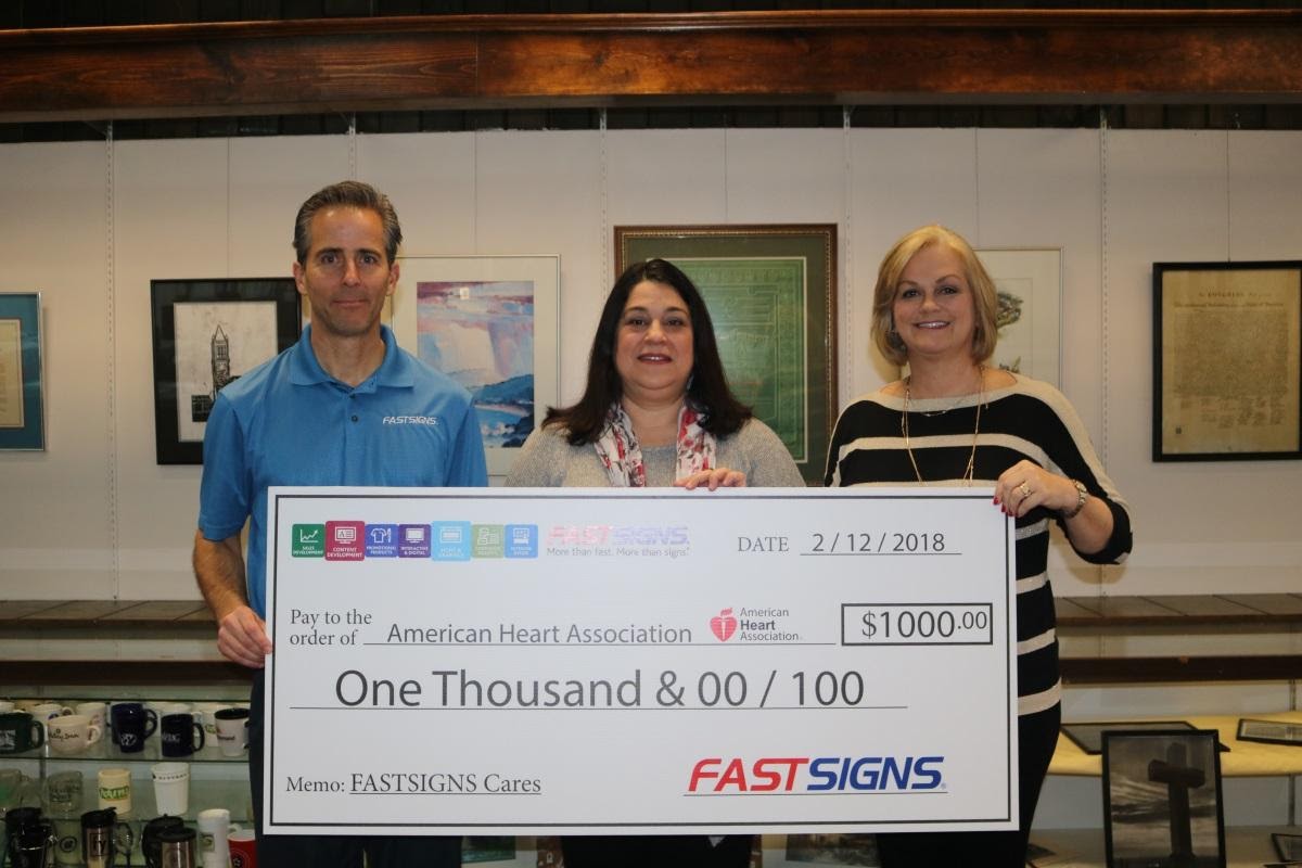 Pictured left to right are Bob Wakeley, FASTSIGNS Business Consultant; Tricia Desvarro, Division Director of the Fayette County Chapter of the American Heart Association; and Brenda Stipanovich, owner of FASTSIGNS of Uniontown.
